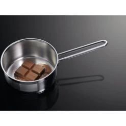 Zanussi ZIAN644K 60cm Induction Hob - Black -Kitchen Series Shop zanussi zian644k melted chocolate in a pan top view